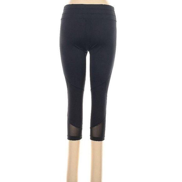 * ATHLETA * Aura Sonar Black Mesh Cropped Leggings size Medium with cut outs - Picture 4 of 4